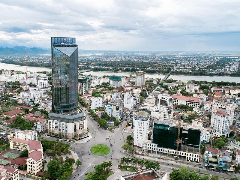 A charming boutique hotel or homestay overlooking the Perfume River in Hue.